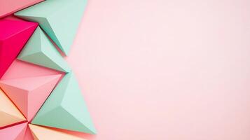 Colorful geometric shapes arranged on a soft pink background creating a modern design aesthetic photo