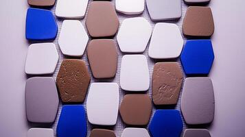Colorful hexagonal tiles arranged in a modern pattern, showcasing a blend of textures and hues photo