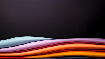 Colorful layered fabric textures with smooth curves against a dark background for design use photo
