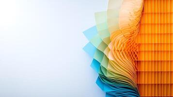 Colorful layers of paper arranged in an artistic wave pattern on a clean background photo