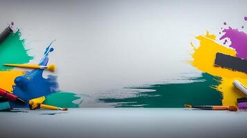 Colorful paint splashes and brushes on a clean surface, ready for artistic creation photo