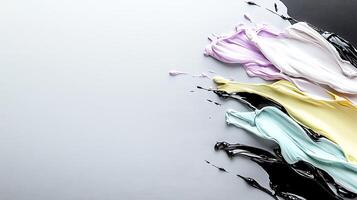 Colorful paint strokes blending on a smooth surface, creating an artistic backdrop for creative projects photo