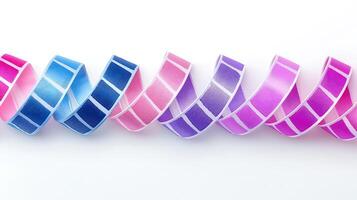 Colorful ribbons in gradient hues arranged in a wave pattern against a white background photo