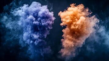 Colorful smoke clouds in contrasting blue and orange against a dark background, creating a dynamic visual effect photo