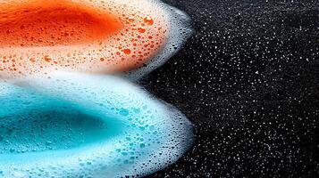 Colorful soap bubbles on a dark surface, creating a vibrant and textured visual effect photo