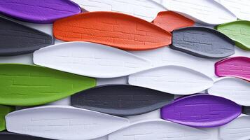 Colorful textured wall design featuring dynamic shapes in various colors and patterns photo