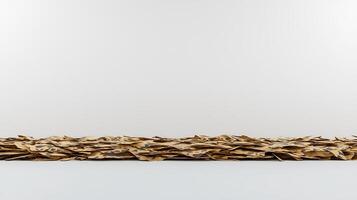 Stacks of dried leaves arranged neatly on a clean surface against a minimalist background photo