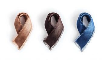 Three elegantly arranged scarves in various colors on a clean white background photo
