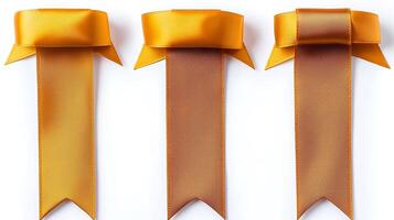 Three elegant golden ribbons with smooth texture, arranged symmetrically on a white background photo