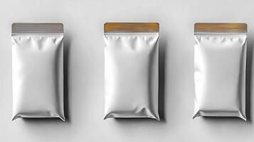 Three identical silver packaging bags arranged neatly on a light background, ideal for product display photo