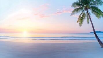 Tranquil beach at sunset with palm tree silhouetted against a colorful sky and calm waves photo