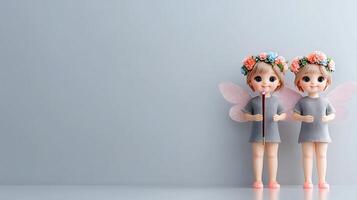 Two charming dolls with floral crowns and wings stand against a soft gray background photo