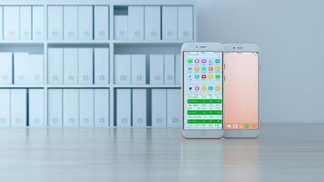 Two smartphones displaying different interfaces in a modern office environment with shelves photo