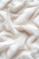 A luxurious white faux fur surface displays soft, wavy textures, beautifully illuminated to evoke a sense of calm and opulence, perfect for various creative projects photo