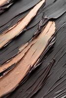 Unique acrylic strokes feature a rich espresso brown base intertwined with shimmering copper accents, showcasing a blend of luxury and sophistication in design photo