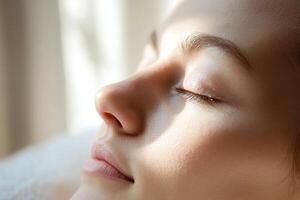 Relaxation fills the air as a person sleeps soundly, illuminated by soft natural light. The tranquil atmosphere conveys a sense of relief from tension headaches and stress photo