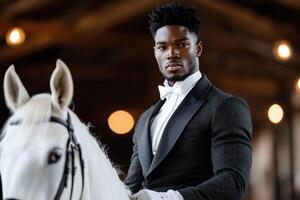 An impressive equestrian rider, dressed in tailored gear, displays poise on a polished horse. Warm lighting creates an atmosphere of exclusivity, highlighting their elegance photo