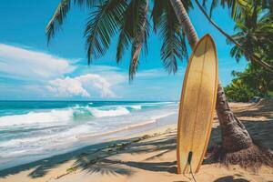 A surfboard leaning against a palm tree on a beach photo