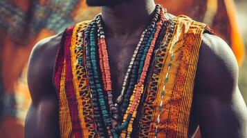 Traditional attire worn by man, showcasing vibrant colors and intricate beadwork, reflecting cultural heritage and pride photo