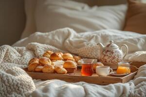 A tray of food on a bed photo