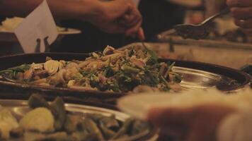 A buffet table with many different types of food video