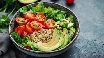 Vibrant Quinoa Bowl with Tomatoes and Avocado photo