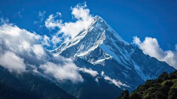 Majestic Mountain Peak Under a Clear Sky photo