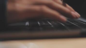 Close up of a person typing on a laptop video