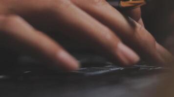 Close up of a person's hand typing on a keyboard video