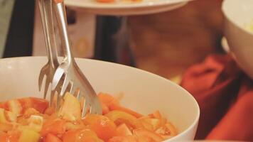 A bowl of food with forks in it video