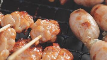Chicken skewers on a grill with a skewer sticking out video