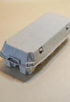 Closed Egg Carton. Top-down view of grey, recycled cardboard container. High quality photo