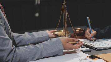 A lawyer and a client are working on a case video