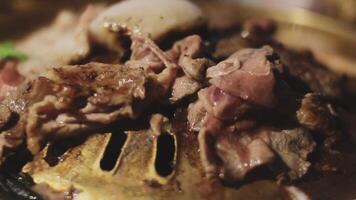A close up of a plate with meat and vegetables video