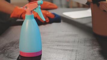A spray bottle with a cleaning product on a table video