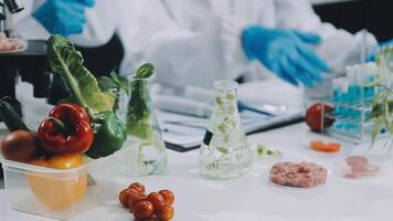 A scientist in a lab with a variety of food video