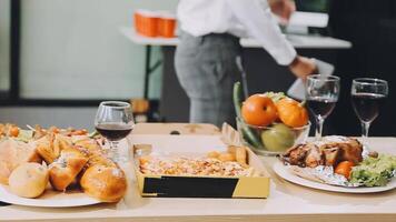 A table with food and wine on it video