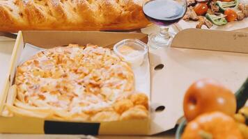 A pizza, a salad, and a glass of wine video