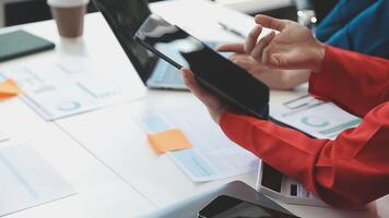 A person is using a tablet computer at a table video