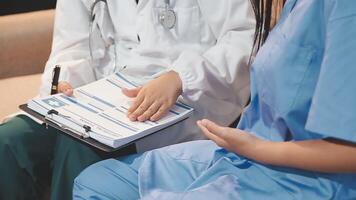 A doctor is talking to a patient video