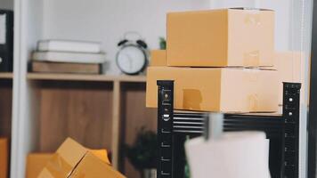 A stack of boxes on a shelf in an office video