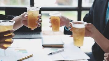 Business people toasting with drinks video