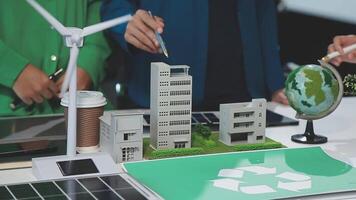 A group of people are working on a recycling project video