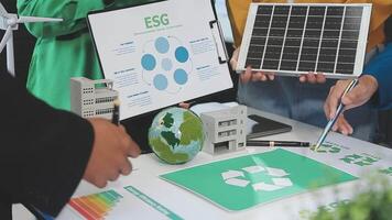 People working on a computer with an eco - friendly design video