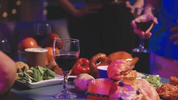 A table with food and wine on it video
