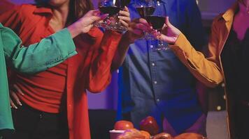 A group of people toasting with wine glasses video