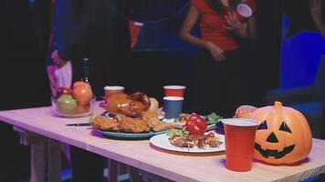 A table with food and drinks on it video