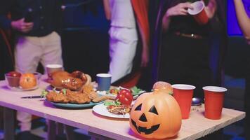 A table with halloween food and drinks video