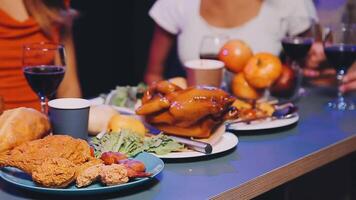 A table with food and wine on it video