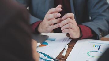 Business people discussing business strategy video